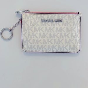 Michael Kor’s wallet pink, white and gray